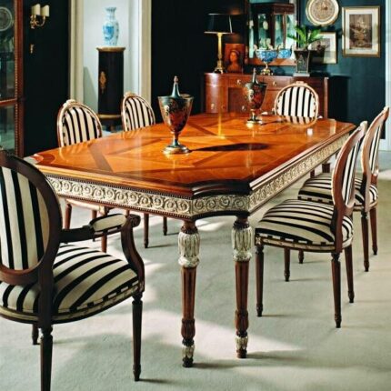 Polished Carved Dining Table with Striped Upholstered Chairs in Classical Luxury Interior